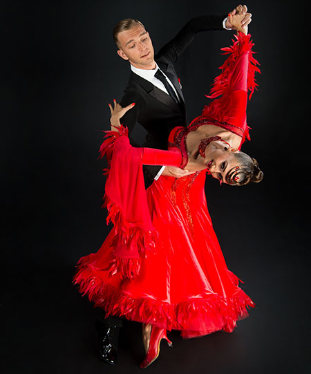 ballrom dance couple in a dance pose isolated on black background - Stock  Image - Everypixel